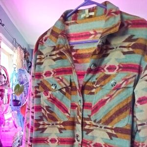 Aztec printed, warm button up with pockets.